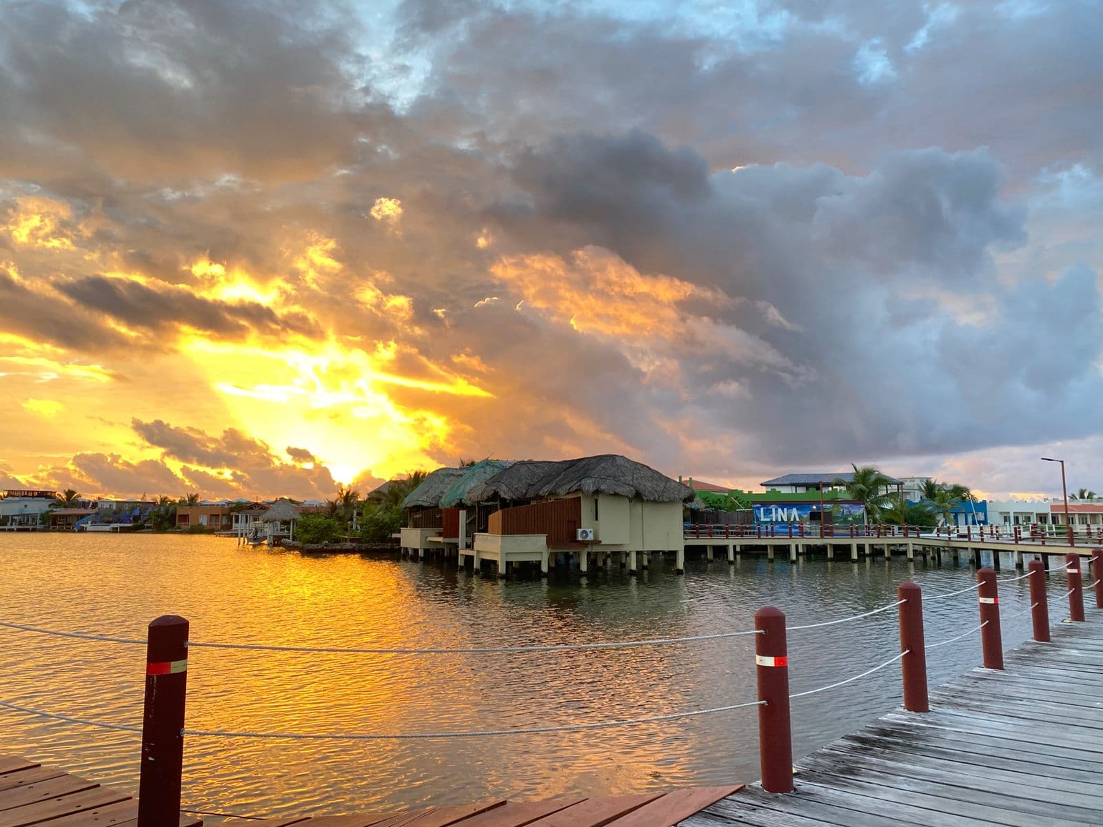 Sunset deck of a one-bedroom overwater cabana at Lina Point, San Pedro